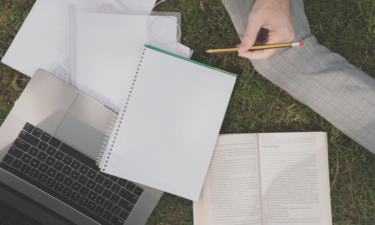 Financial planning session with documents and calculator on desk